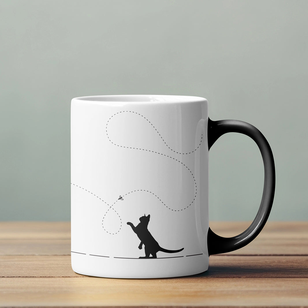 rear View -Cat silhouette chasing a fly printed on a Cute coffee mug | Tootypop